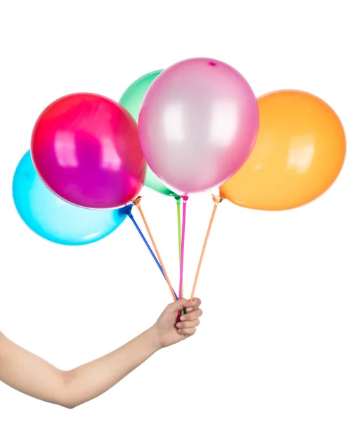 Mano sostiene globos de colores aislados sobre un fondo blanco . —  Fotos de Stock