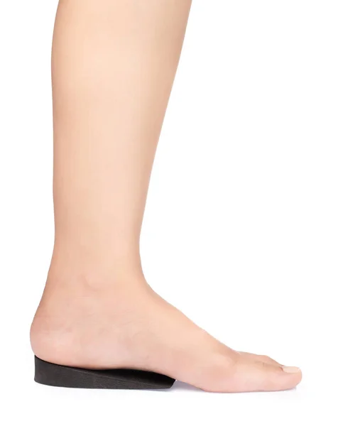 Beine und gefilzte Einlagen für Schuhe isoliert auf weißem Hintergrund — Stockfoto