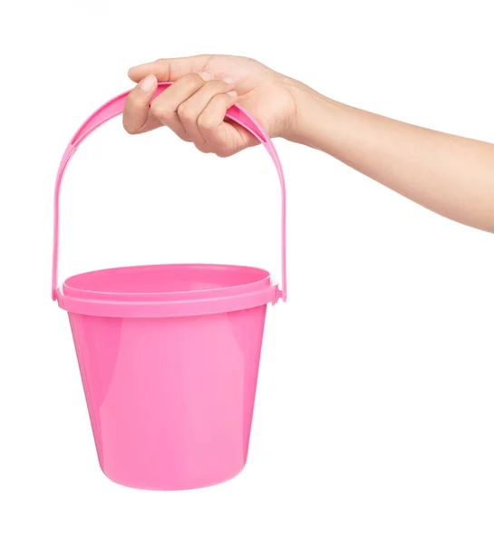 Mano celebración cubo de plástico rosa para el agua aislada en bac blanco —  Fotos de Stock
