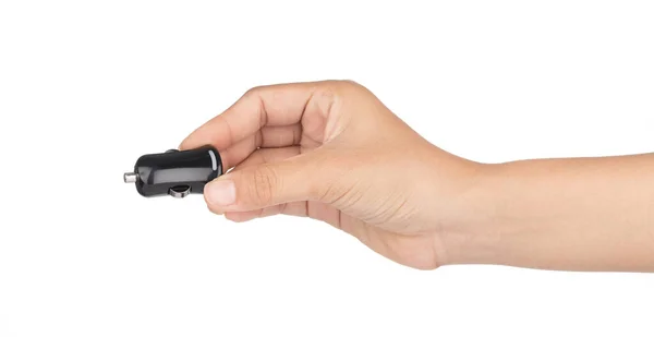 Hand holding Black USB electronics device car charger isolated o — ストック写真