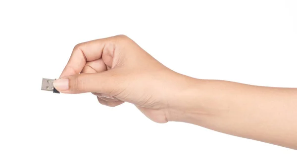 Hand holding Small Flash Drive isolated on a white background — ストック写真