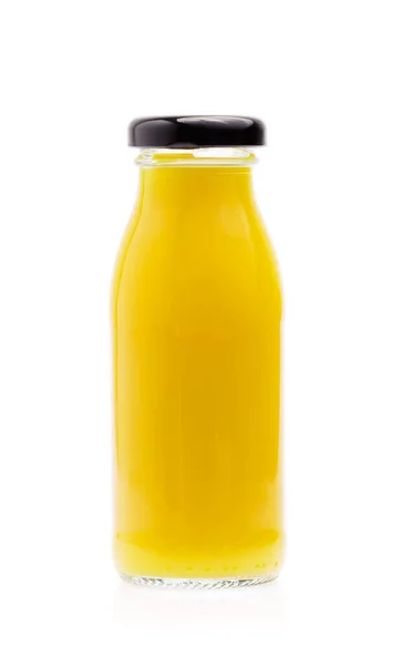 Refreshing mango drink to bottle glass isolated on white backgro — ストック写真