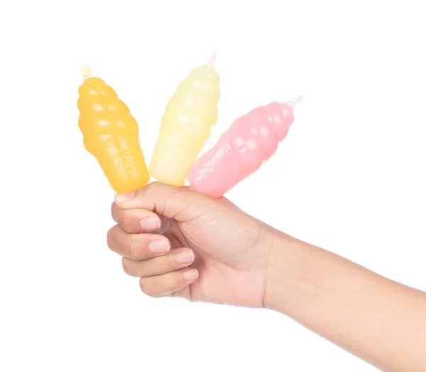 Hand holding Jelly in plastic containers shape ice cream isolate — Stok fotoğraf