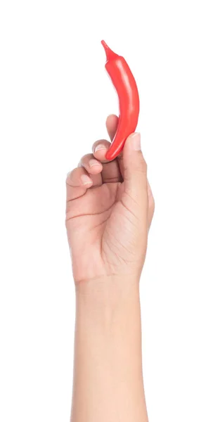 Hand hält Plastikspielzeug Chili isoliert auf weißem Hintergrund — Stockfoto