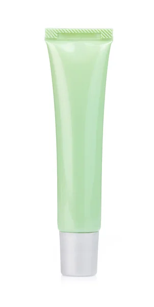 Tubo cosmético verde isolado sobre fundo branco . — Fotografia de Stock