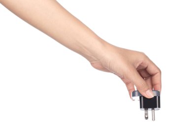 hand holding 3 pin mains plug isolated on white background