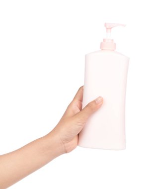 hand holding lotion isolated on white background