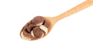 Cereal chocolate on spoon isolated on white background