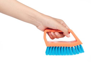 hand holding A plastic clothes brush isolated on white backgroun