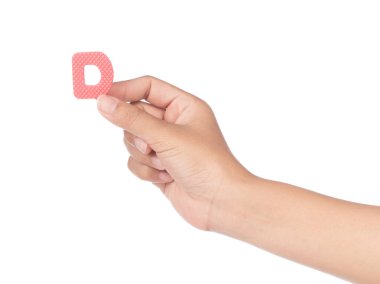 hand holding alphabet made from EVA foam isolated on white backg