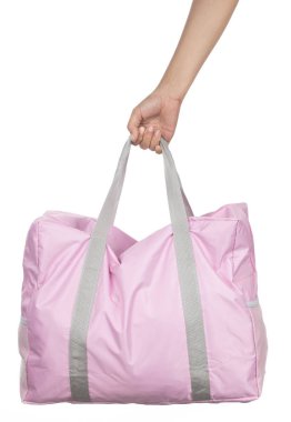 Hand holding Casual Travelling Bag isolated on white background