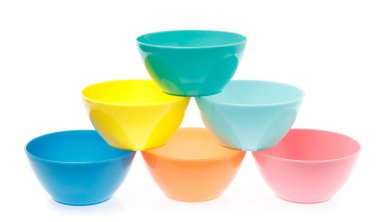 Empty colorful plastic bowl isolated on white background