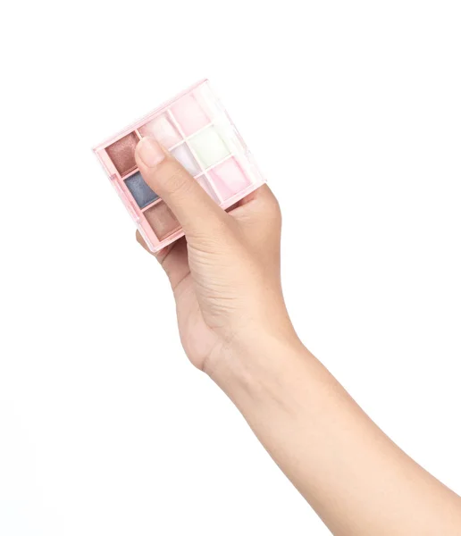 Hand houden oogschaduw cosmetica geïsoleerd op witte achtergrond — Stockfoto