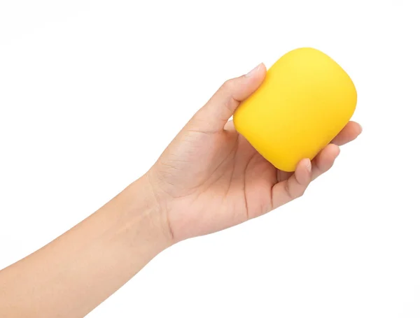 Hand holding sponge cap for music microphone isolated on white b — Stock Photo, Image