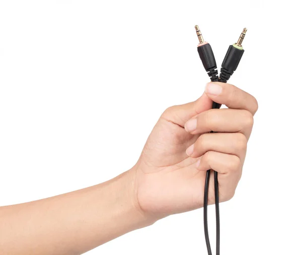 Hand houden Audio jack met kabel geïsoleerd op witte achtergrond. — Stockfoto