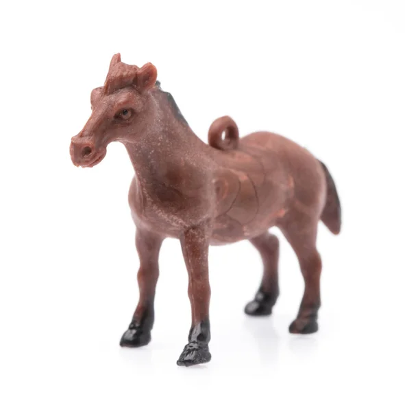 Spielzeugpferd aus Kunststoff isoliert auf weißem Hintergrund — Stockfoto