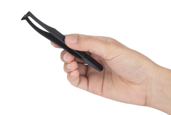 Mão segurando pinças anti-estáticas pretas isoladas no backgr branco — Fotografia de Stock