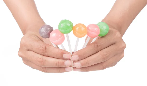 Hand holding lollipop candy isolated on white background — Stock Photo, Image