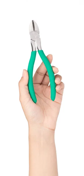Handen håller gröna sidavbitartänger isolerade på en vit baksida — Stockfoto
