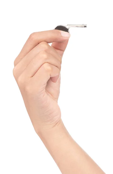 Рука держит металлический свисток изолирован на белом фоне — стоковое фото