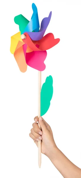 Hand holding Colored pinwheel Isolated on White background — Stock Photo, Image
