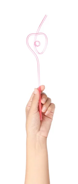 Hand holding a straw isolated on white background — ストック写真