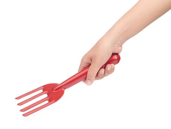 Hand holding Red Garden rake isolated on white background — Stock Photo, Image