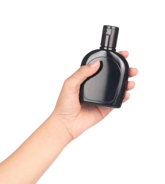 Mão segurando garrafa cera proteção do produto para carro e couro i — Fotografia de Stock