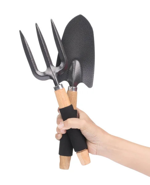 Hand holding Steel rake and shovel isolated on a white backgroun — ストック写真