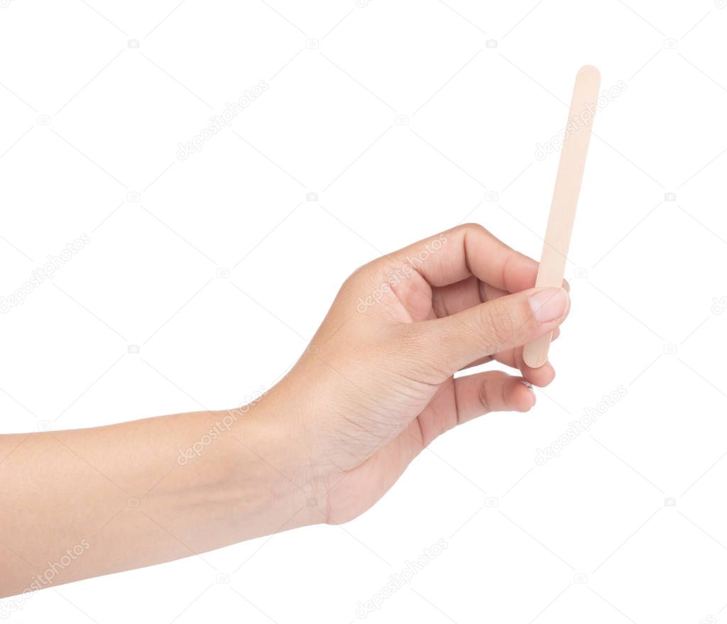hand holding Wooden ice cream stick isolated on white background