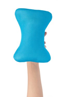 hand holding neck pillow isolated on white background