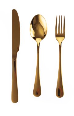 Golden Cutlery Set. Fork, Spoon and Knife isolated on white back