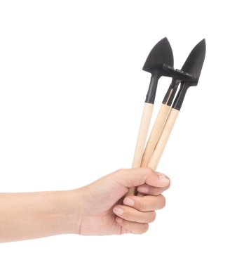 hand holding set of Gardening Tools isolated on a white backgrou