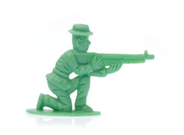 plastic toy cowboy isolated on white background