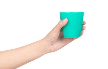 hand holding a green plastic glass isolated on a white backgroun
