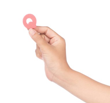 hand holding alphabet made from EVA foam isolated on white backg