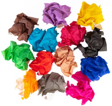 stack of multi colored crumpled paper balls isolated on white ba
