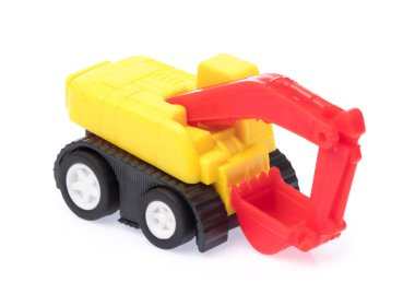 Oyuncak traktör beyaz bir arkaplanda izole edilmiş..