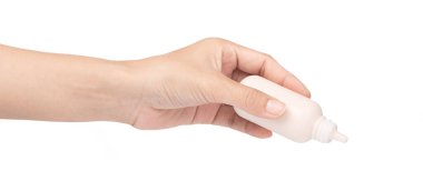 hand holding makeup liquid foundation isolated on white backgrou