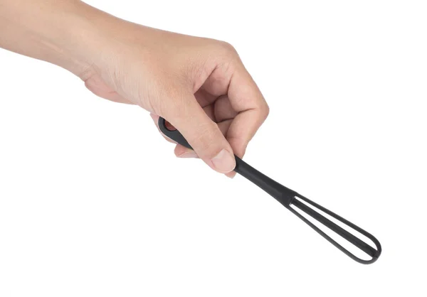 Hand holding small whisk egg beater isolated on a white backgrou — 스톡 사진