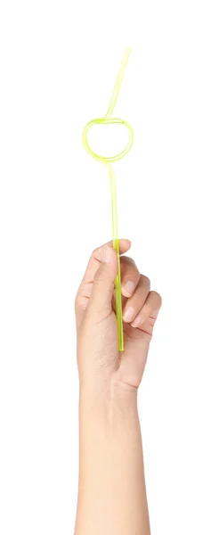 Hand holding a straw isolated on white background — Stockfoto