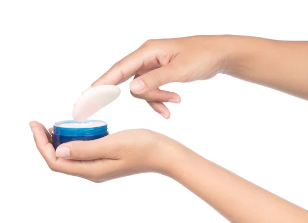 Hand holding cosmetic sponge with powder isolated on white backg — 스톡 사진