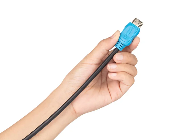 Рука тримає кабель HDMI ізольовано на білому тлі . — стокове фото