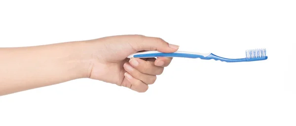 Hand holding toothbrush isolated on white background — Stock Photo, Image