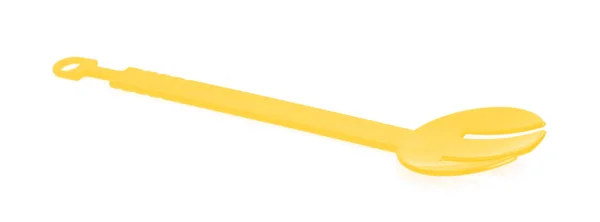 Yellow plastic kitchen utensil isolated on a white background — Stockfoto