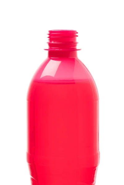 Plastic bottle of raspberry drink isolated on white background — ストック写真