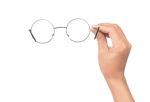 Hand holding blue eye glasses isolated on white background — Stockfoto