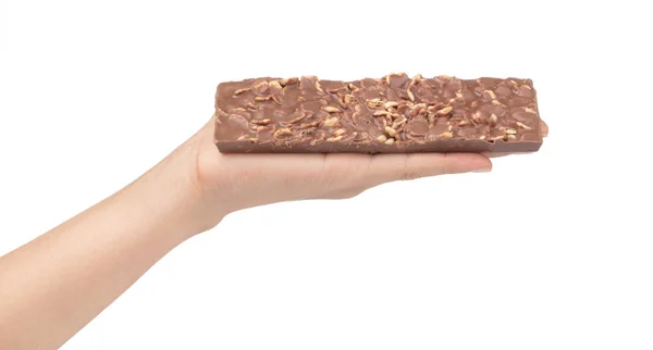 Kézben tartó csokoládé bar gabonapehely izolált fehér backgro — Stock Fotó