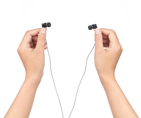 Hand holding Earphones isolated on a white background — 图库照片