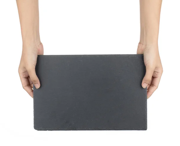 Mão segurando pedra preta vazio retangular, prato quadrado isolado — Fotografia de Stock